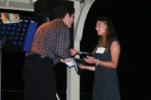 Ashley Stokes accepting Cattlewoman of the Year Award